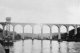 Calstock viaduct photographed from a vessel on the River Tamar circa 1910. Wagon lift on the left
