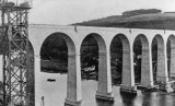The completed Calstock viaduct in 1908, showing the wagon lift under construction.