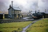 At Torpantau on 27th January 1962, 57xx Class 0-6-0PT No. 8702 waits with the 12.10pm from Brecon.