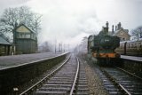 Ex-GWR 57xx 0-6-0PT No 8702 with the 12.10pm to Newport at Brecon on 27th Jan 1962