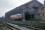 A WR railcar on a service from either Woofferton or the Severn Valley line passes Kidderminster Goods Shed circa 1961