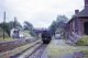 A pannier tank sits alongside the disused platform at Halesowen station in August 1966