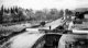 Newport Wharf on the Shropshire Union Canal circa 1910, with a laden narrowboat passing through Lock 20.