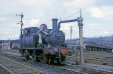 14xx Class 0-4-2T No. 1420 taking water at Leominster South End in April 1964