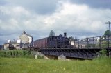 No. 1434 rumbles across the bridge over the River Culm as it departs Uffculme with a train for Hemyock on 12th June 1962
