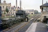 No 9678 pauses to collect the token from the Heathfield signalman on 12th August 1961