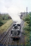 No 9678 arriving at Heathfield with a lengthy goods train on 12th August 1961