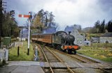 No 5569 and train arriving at Lifton on 3rd April 1962