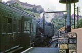 Taking water at Calstock. Note the boxes of strawberries for loading on the next Up train on the right. Photo believed to have been taken in August 1963