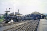 Fowler Class '4F' No. 44544 and BR Standard 4-6-0 No. 75009 wait to leave Bath Green Park station with the 9.15am to Templecombe on 13th March 1962
