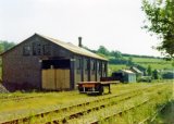 The goods shed at Newcastle Emlyn in June 1974. Note: Photo taken with a 110 camera. The neg has deteriorated beyond use and the print is on a mottled surface photo paper, so this scan is the best we can achieve.