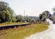 The derelict platform and level crossing at Bronwydd Arms in June 1974. Note: Photo taken with a 110 camera. The neg has deteriorated beyond use and the print is on a mottled surface photo paper, so this scan is the best we can achieve.