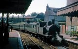 An unidentified O2 Class loco reverses its train out of Cowes station prior to running round the carriages for departure back to Newport in August 1964