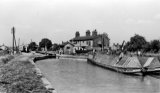 A pair of narrowboats moored near King's Lock at Booth Lane, Middlewich, on the Trent & Mersey Canal circa 1950