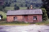 This is part of a survey of Dinas Mawddwy station comprising 26 shots all taken c1970, long after the track had been lifted but whilst all of the major structures still remained. Today only the station building survives, as a private residence.