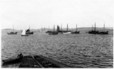 Scilly Isles St Marys French crabbers with Guys boat in foreground Guy by slip 1912 CMc.jpg