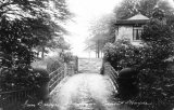 The iron bridge, now restored, leading to Brabyns Estate, Marple, circa 1904. The gatehouse is also just visible.