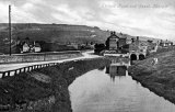 A view along an arm of the Peak Forest Canal at Marple, circa 1906, with Strines Road on the left.
